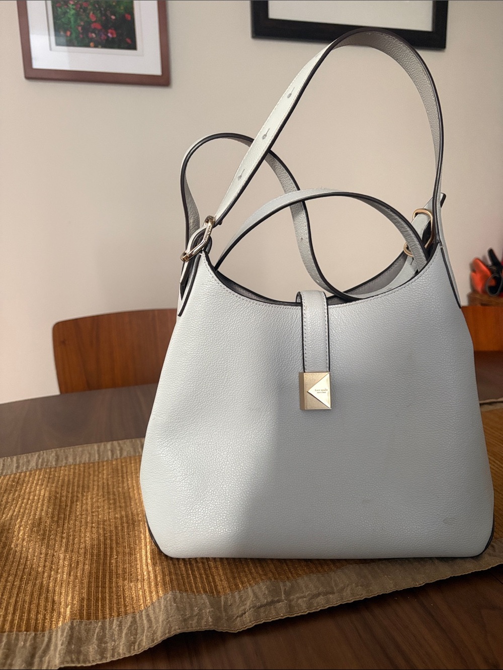 Kate Spade light gray leather satchel with gold accents